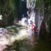 Walking through the cold water of the jungle